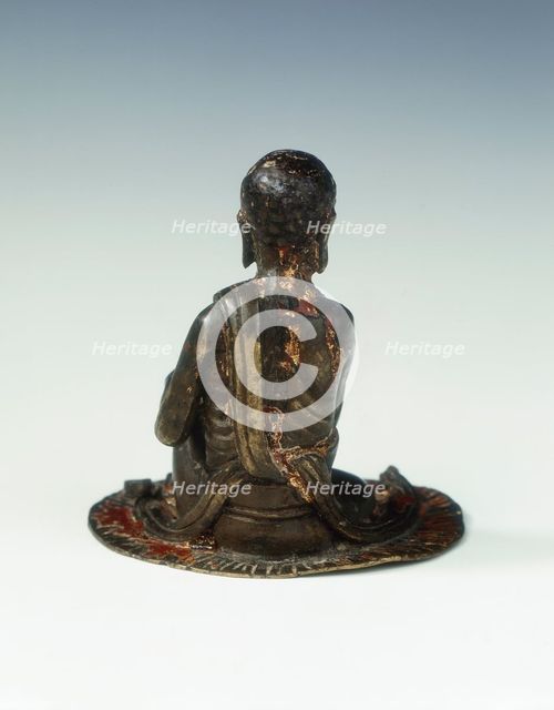 Gilt bronze statue of a lohan seated on a rush mat, late Ming dynasty, China, 1600-1644. Creator: Unknown.