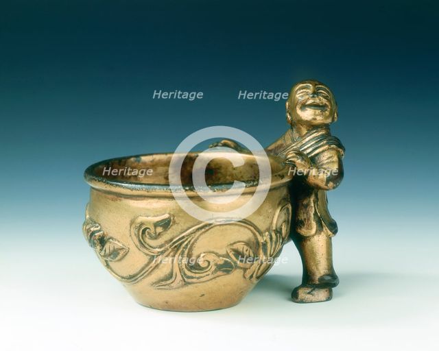 Gilt bronze water container with boy holding the rim, Ming dynasty, China, c early 16th century. Creator: Unknown.