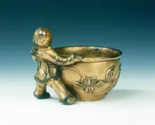 Gilt bronze water container with boy holding the rim, Ming dynasty, China, c early 16th century. Creator: Unknown
