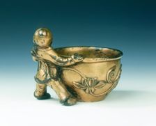 Gilt bronze water container with boy holding the rim, Ming dynasty, China, c early 16th century. Creator: Unknown