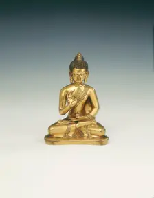 Gilt brass Amoghasiddhi, Buddha of infallible magic, Mongolia, 18th century. Creator: Unknown