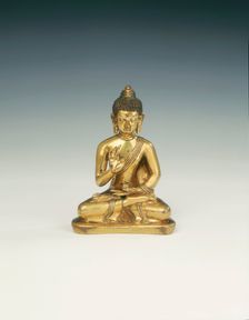 Gilt brass Amoghasiddhi, Buddha of infallible magic, Mongolia, 18th century. Creator: Unknown