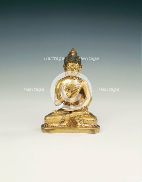 Gilt brass Amoghasiddhi, Buddha of infallible magic, Mongolia, 18th century. Creator: Unknown.
