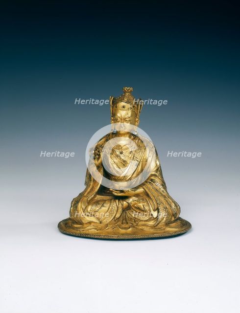 Gilt brass Padmasambhava holding attributes, Tibet, 16th-17th century. Creator: Unknown.