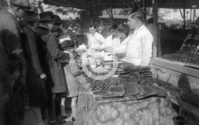 Gingerbread seller, Paris, 1931. Artist: Ernest Flammarion