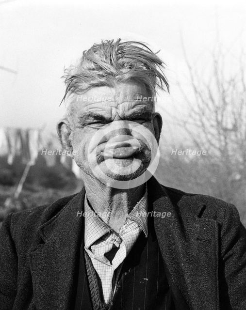 Gipsy pulling a 'gurney face', Lewes, Sussex, 1964. 