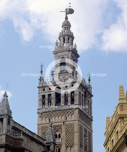 Giralda Tower in Seville, two-thirds are from 12th century in Almohad style and the top was finis…
