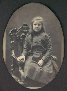 [Girl with Ringlets, Seated, Three-Quarter Length], 1890s. Creator: Frederick Gutekunst