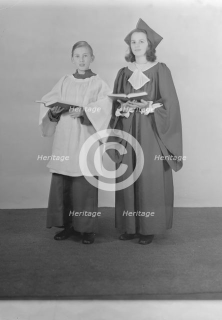 Girl and boy chorister, (Isle of Wight?), c1935. Creator: Kirk & Sons of Cowes.