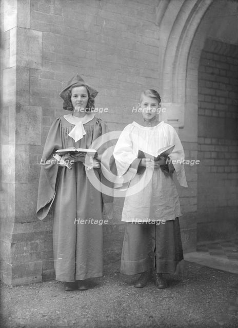 Girl and boy chorister, (Isle of Wight?), c1935. Creator: Kirk & Sons of Cowes.