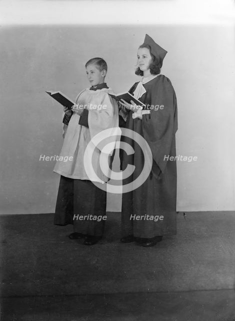 Girl and boy chorister, (Isle of Wight?), c1935. Creator: Kirk & Sons of Cowes.