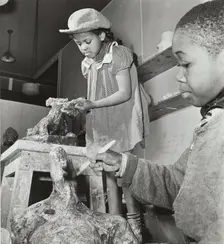 Girl and boy sculpting, Harlem Art Center, 1939. Creator: Berenice Abbott