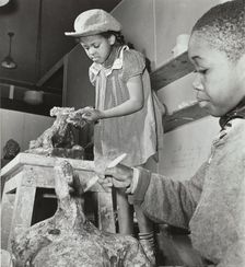 Girl and boy sculpting, Harlem Art Center, 1939. Creator: Berenice Abbott