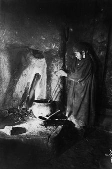 Girl at the hearth, late 19th cent - early 20th cent. Creator: I Popov