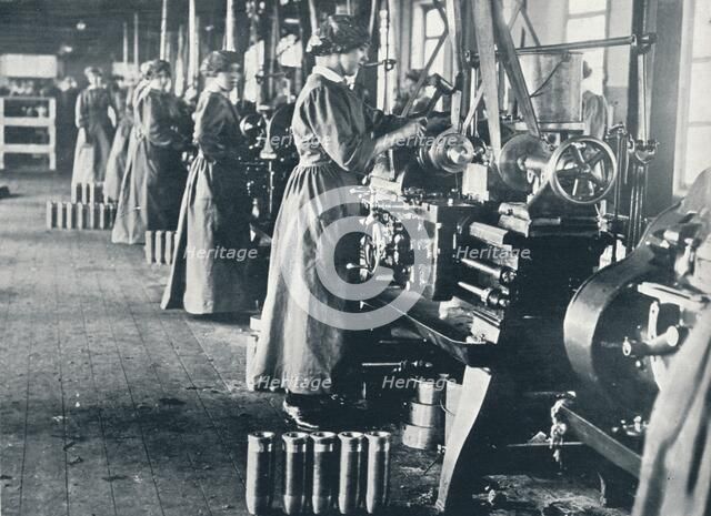 Girl munition workers at their lathes in a Scottish mill, c1914. Artist: Unknown