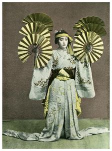 Girl performing a fan dance, Japan, 1904