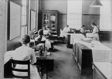 Girl Scouts - War Sewing with Red Cross, 1917. Creator: Harris & Ewing