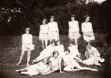 Girls Greek dancing class pose on lawn, 1929