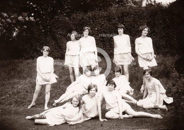 Girls Greek dancing class pose on lawn, 1929. Artist: Unknown