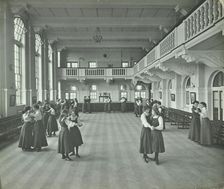 Girls dancing in the assembly hall, Clapham Secondary School, London, 1910