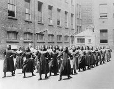 Girls exercising at the Jewish Free School, 1900-1910. Creator: Unknown