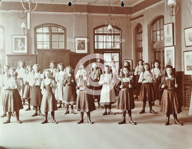Girls holding Indian clubs, Cromer Street School/ Argyle School, St Pancras, London, 1906. Artist: Unknown.