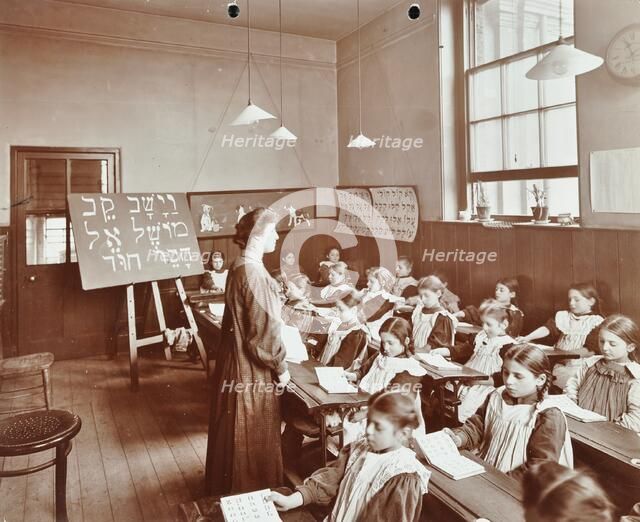 Girls' Hebrew reading lesson, Jews' Free School, Stepney, London, 1908. Artist: Unknown.