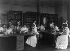 Girls in a science laboratory at Eastern High School, Washington, D.C., (1899?). Creator: Frances Benjamin Johnston