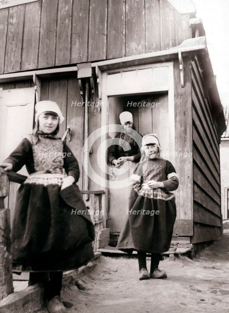 Girls in traditional dress, Marken Island, Netherlands, 1898.Artist: James Batkin