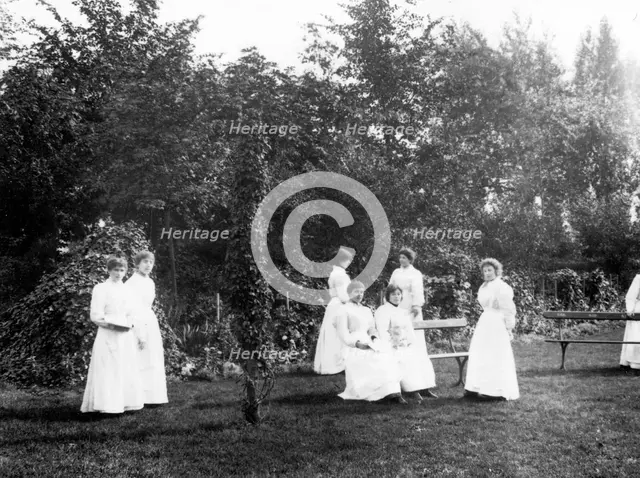 Girls on the Social Block lawn, York,Yorkshire, 1907. Artist: Unknown
