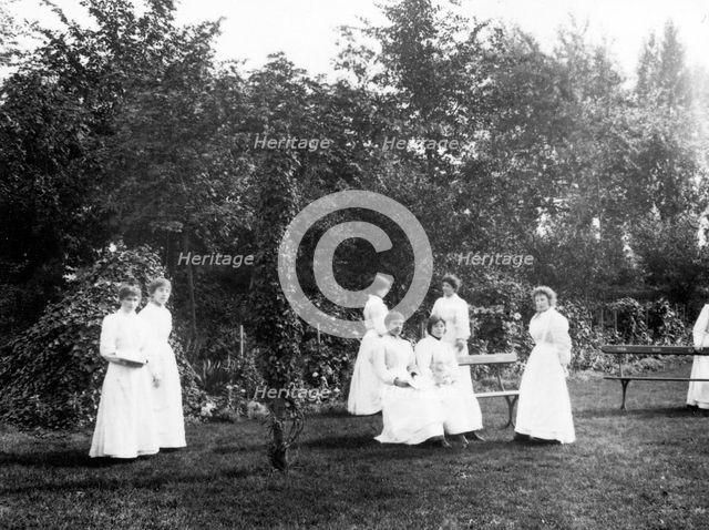 Girls on the Social Block lawn, York,Yorkshire, 1907. Artist: Unknown