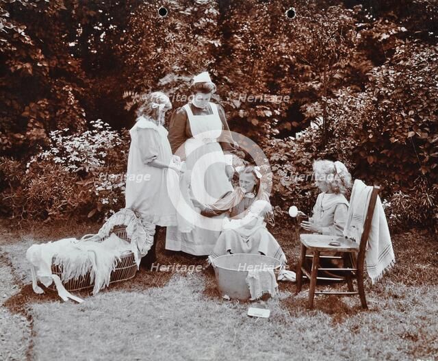 Girls learning infant care, Birley House Open Air School, Forest Hill, London, 1908. Artist: Unknown.