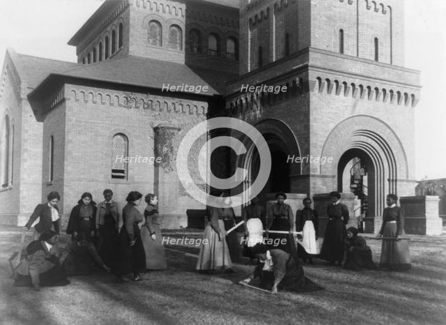Girls measuring piece of ground in arithmetic class at Hampton Institute, Hampton, Va., 1899 or 1900 Creator: Frances Benjamin Johnston.