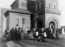 Girls measuring piece of ground in arithmetic class at Hampton Institute, Hampton, Va., 1899 or 1900 Creator: Frances Benjamin Johnston