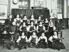 Girls swimming championship team with their shield, Tollington Park Central School, London, 1915