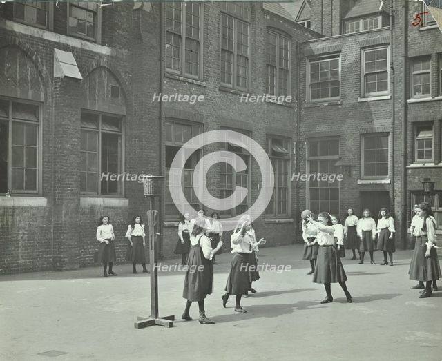 Girls playing netball in the playground, William Street Girls School, London, 1908. Artist: Unknown.