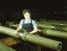 Gist inspector, Mrs. Mary Betchner inspecting one of the 25 cutters..., Milwaukee, Wis. , 1943. Creator: Howard Hollem