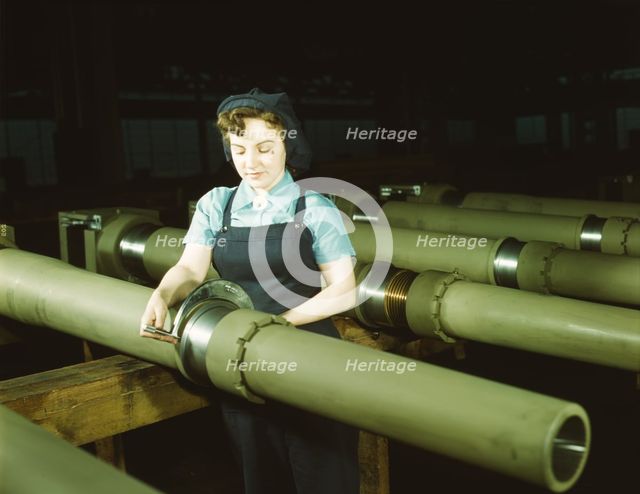 Gist inspector, Mrs. Mary Betchner inspecting one of the 25 cutters..., Milwaukee, Wis. , 1943. Creator: Howard Hollem.