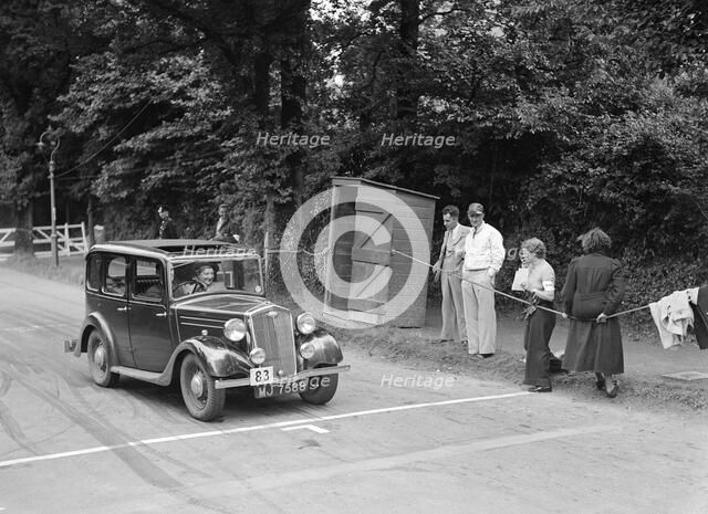 GK Collier's Wolseley Wasp, winner of a silver award at the MCC Torquay Rally, July 1937. Artist: Bill Brunell.