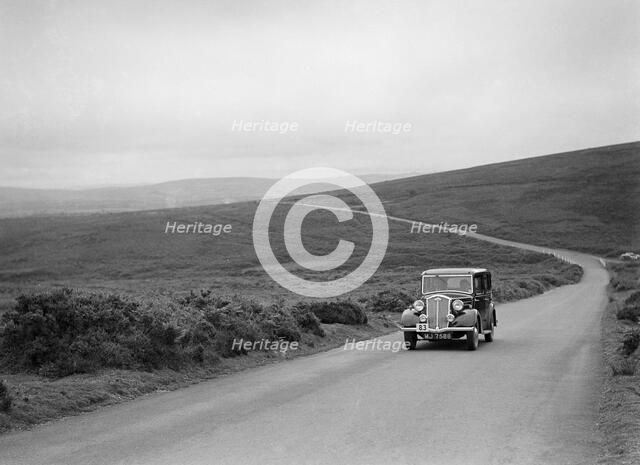 GK Collier's Wolseley Wasp, winner of a silver award at the MCC Torquay Rally, July 1937. Artist: Bill Brunell.