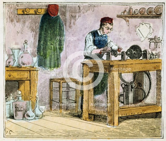 Glass cutter decorating table ware on a carborundum wheel, 1867. Creator: Unknown.
