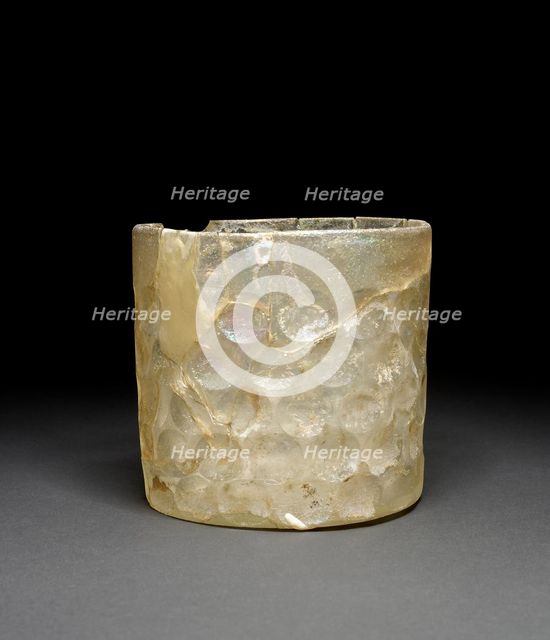 Glass beaker with circular facets, Sasanian Period, 226-651. Artist: Unknown.