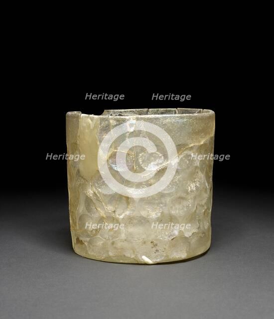 Glass beaker with circular facets, Sasanian Period, 226-651. Artist: Unknown.