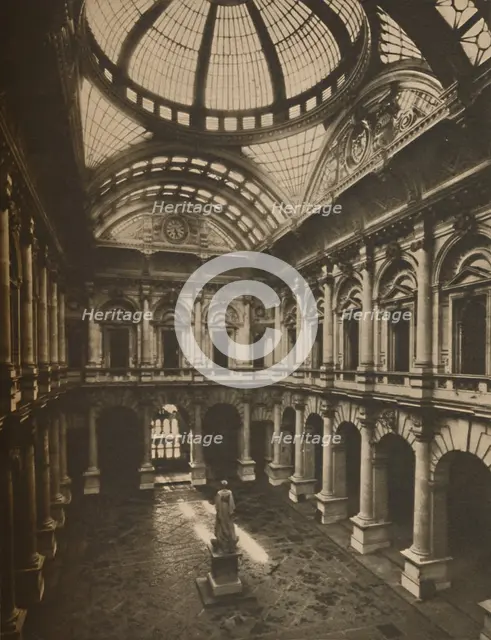 'Glass-Roofed Interior Court of the Royal Exchange', c1935. Creator: Joel.