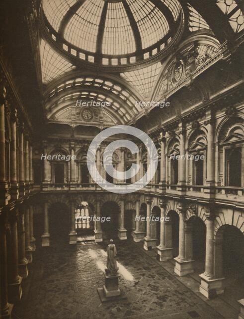 'Glass-Roofed Interior Court of the Royal Exchange', c1935. Creator: Joel.