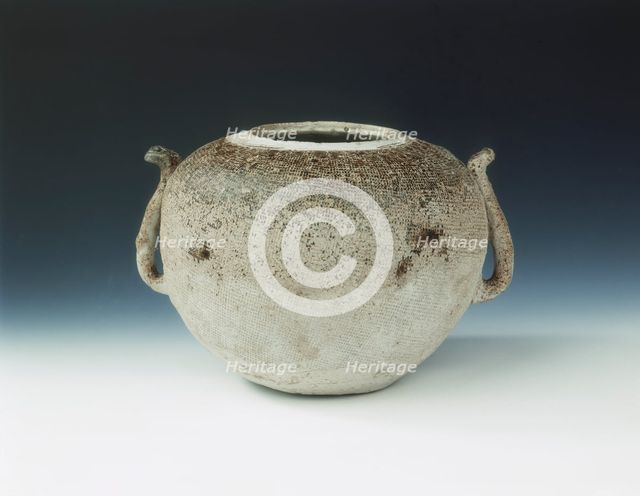 Glazed pottery jar impressed with cloth pattern, Warring States period, China, c4th century BC.   Creator: Unknown.