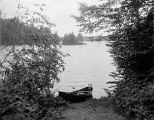 Glimpse of Upper St. Regis Lake, Adirondack Mtns., N.Y., between 1900 and 1910. Creator: Unknown