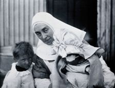 Gloucester smallpox epidemic, 1896: Elsie Clutterbuck (right), a smallpox patient, with..., 1896. Creator: HCF of Gloucester