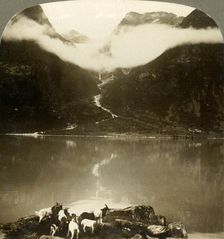 Grytereids glacier glittering above drifting clouds, across placid Lake Olden, Norway c1905. Creator: Unknown