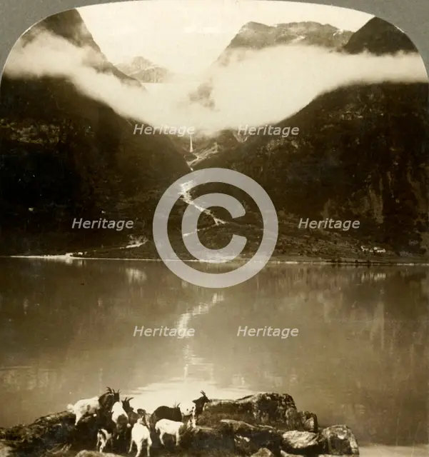 'Grytereids glacier glittering above drifting clouds,  across placid Lake Olden, Norway', c1905. Creator: Unknown.